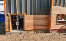 Cedar wood cladding and kingsman sheets at Gosforth Academy Cedar wood cladding and kingsman sheets at Gosforth Academy